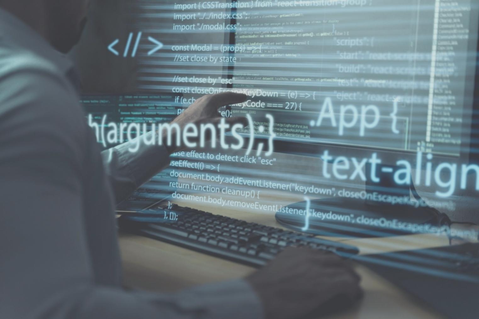 Modern classroom setup with students working on individual coding projects